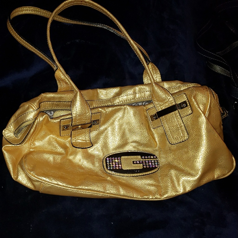 Gold guess purse